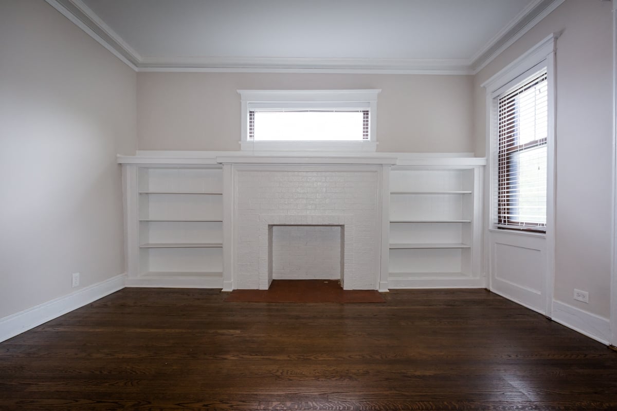 living room renovated remodeled hyde park chicago apartment fireplace storage